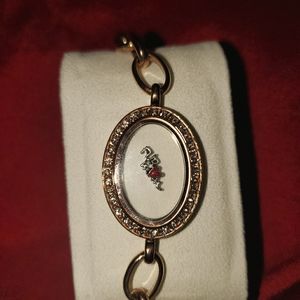 Origami owl locket bracelet.